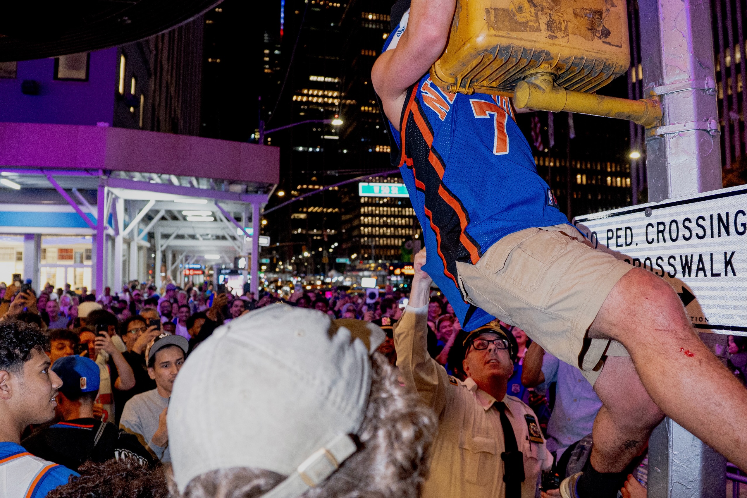 Knicks fans crowd Midtown streets for postseason celebrations, photograph 1 of 10