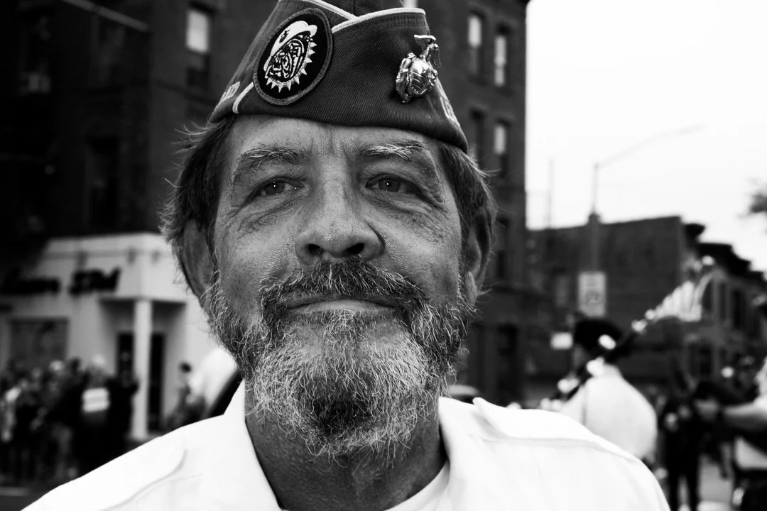 Memorial Day marchers carry flags through Bay Ridge, photograph 1 of 10
