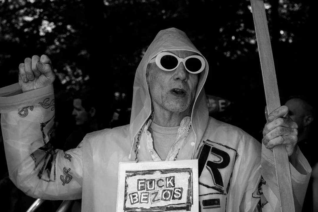 Demonstrators protest wealth and power outside Met Gala, photograph 1 of 10