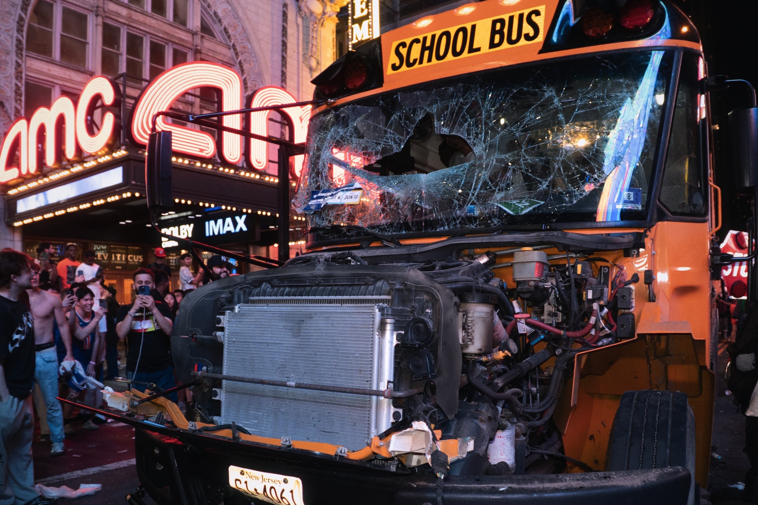 NYPD responds as Knicks fans swarm buses after title win, photograph 1 of 10